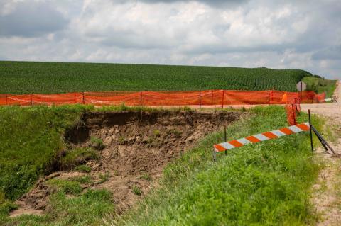 Roads across the county were ravished by rain storms earlier in the summer, causing County Commissioners to close one minimum maintenance road during the Aug. 28 meeting. 