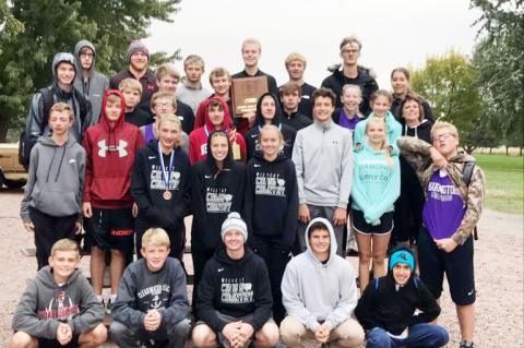The Hartington-Newcastle cross country teams wound up the regular season Friday at the Lewis and Clark Conference meet at Rolling Hills Golf Course, Wausa. Team members are: (top row) Parker Albers, Matthew Meisenheimer, Zach Burcham, Mack Kuehn, Carson Becker, Sam Harms, Coach Mandy Hochstein,(second row from top) Jaxson Bernecker, Bennet Sievers, Calvin Christensen, Chase Lammers, Cole Noecker, Laney Kathol, Kylie Clinebell, Coach Laura Noecker, (second row from bottom) Lukas Wortmann, Shay Dickes, Jude K