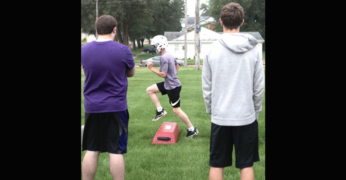 Hartington-Newcastle’s Shaye Morten runs a drill during the first practice of the season in Hartington Monday. The Wildcats will move down to Class D2 this season and will have a bit of a target on their backs as they have been rated in the Top 10 in the preseason Huskerland Report football poll.