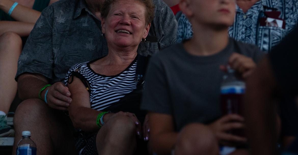 Timo and Mirja Havulinna of Finland enjoy to Scotty McCreery concert during the Cedar County Fair in Hartington, Neb., on Friday, July 20, 2018. Photo by Elsie Stormberg